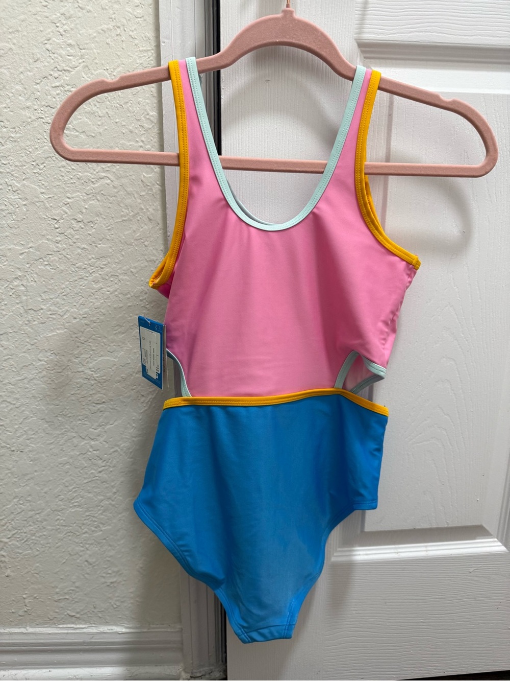 DSG multi colored black one piece swimsuit NWT